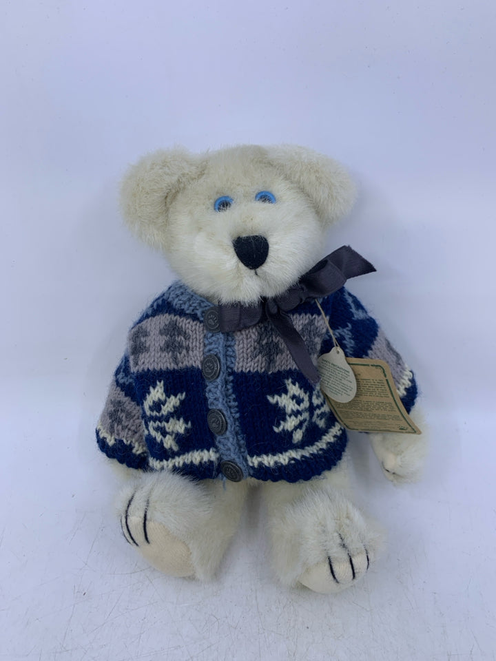 WHITE BEAR W/ SNOWFLAKE SWEATER ON.