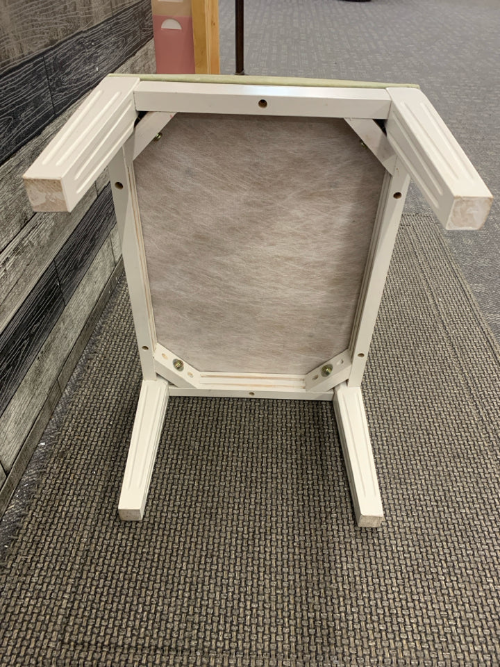 GREEN EMBROIDERED FOOT STOOL W WHITE LEGS.