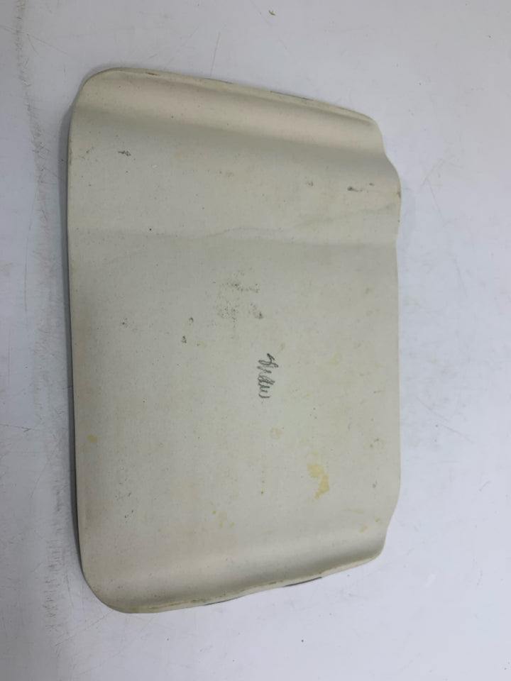 CREAM UNEVEN POTTERY TRAY W/ PINK GRAY STRIPES.