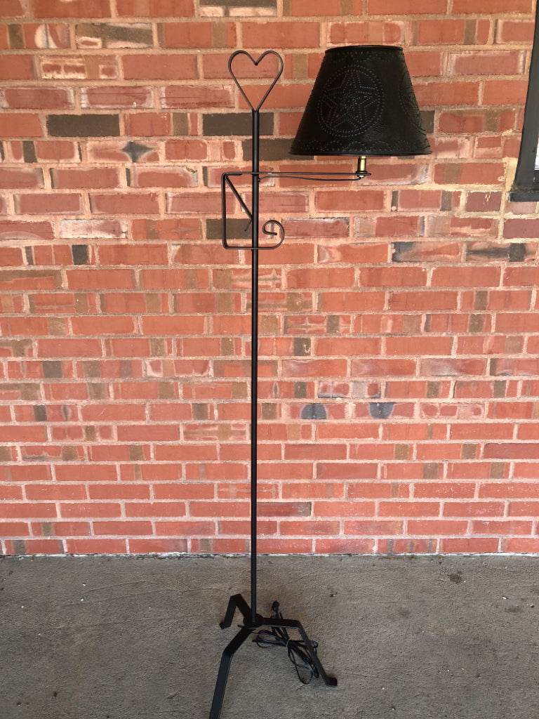 PRIMITIVE PUNCHED METAL FLOOR LAMP.