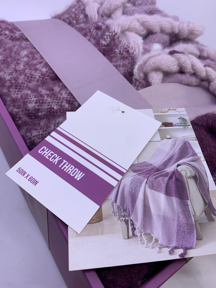 NIB PURPLE THROW CHECK.