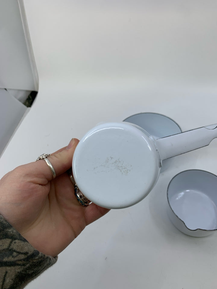 3 HEAVY NESTING ENAMEL WHITE SAUCE PANS.