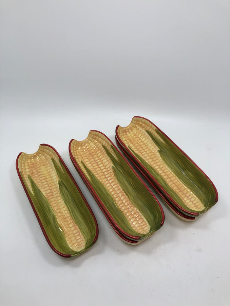 5 CERAMIC CORN HOLDERS.
