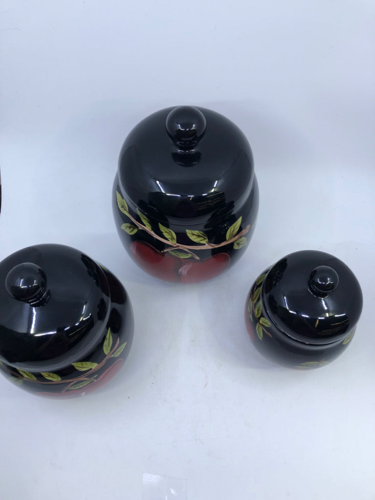 3 BLACK CANISTERS W/ PAINTED RED APPLES/BRANCHES.