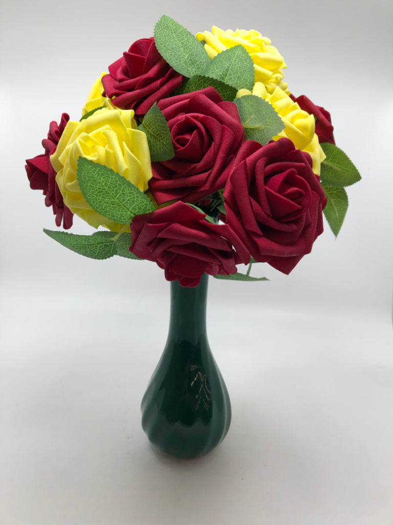 FAUX YELLOW & RED ROSES IN GREEN VASE.