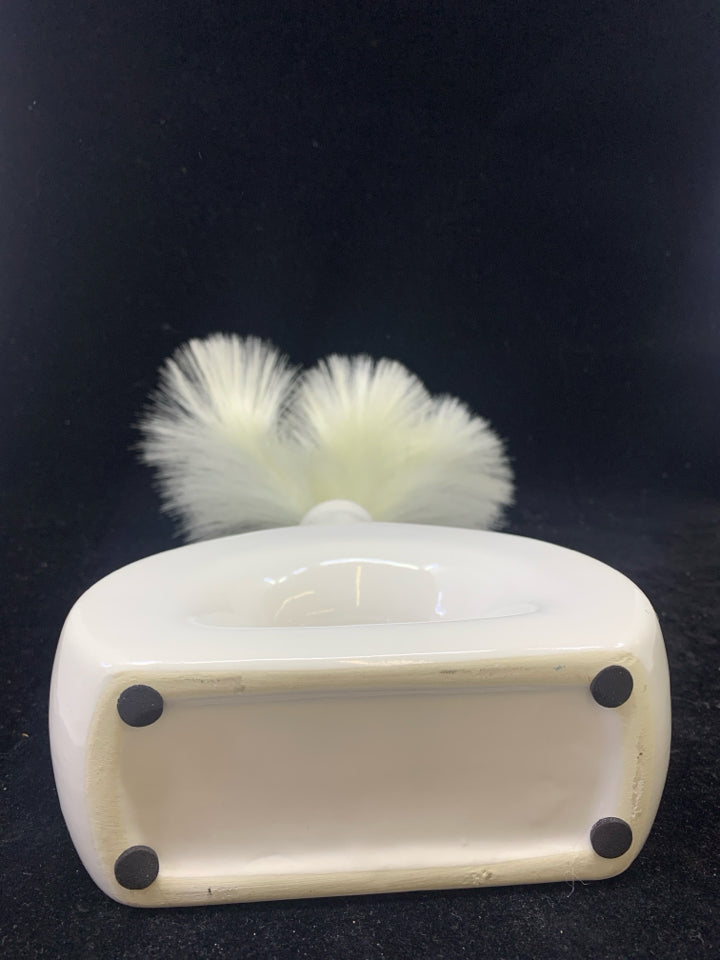FAUX PAMPAS PLANT IN WHITE OVAL VASE.