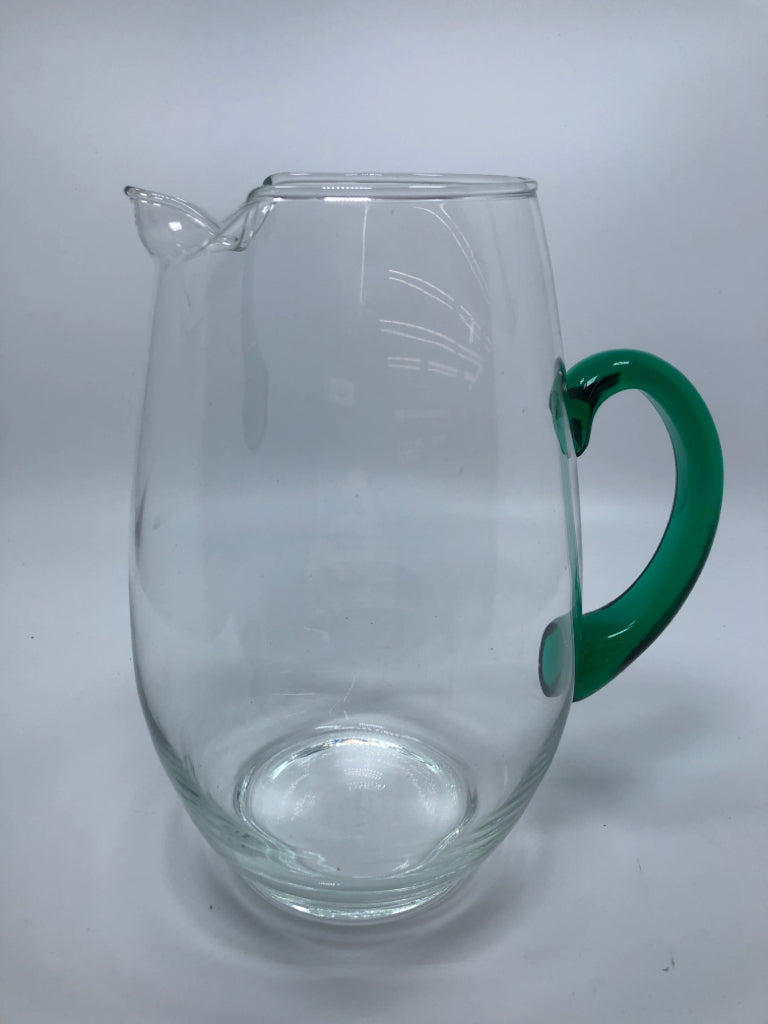 CLEAR GLASS PITCHER W/GREEN GLASS HANDLE.