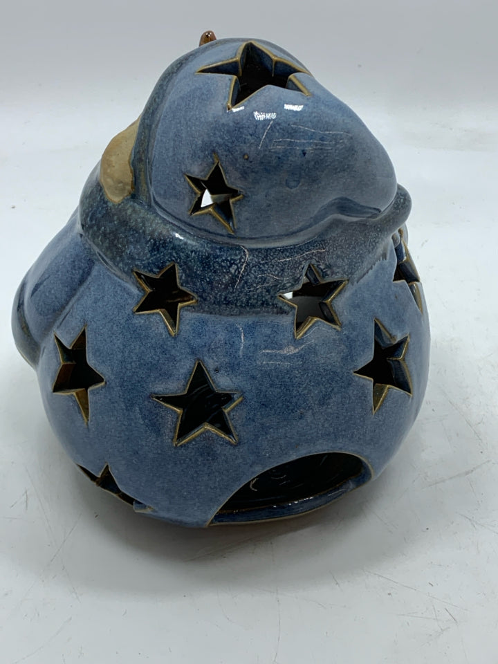 BLUE STAR PIERCED FAT SNOWMAN TEALIGHT HOLDER.