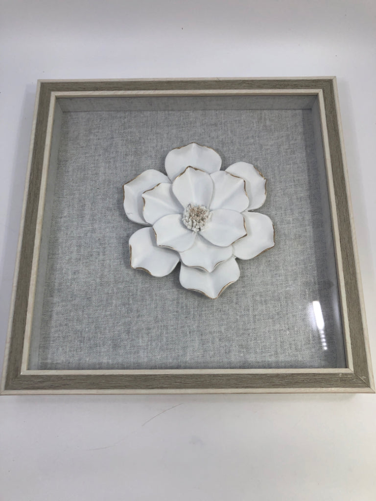 WHITE FLOWER IN GREY SHADOWBOX FRAME.