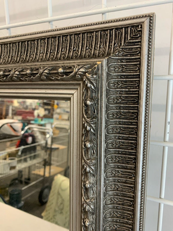 SILVER FRAMED WALL MIRROR.