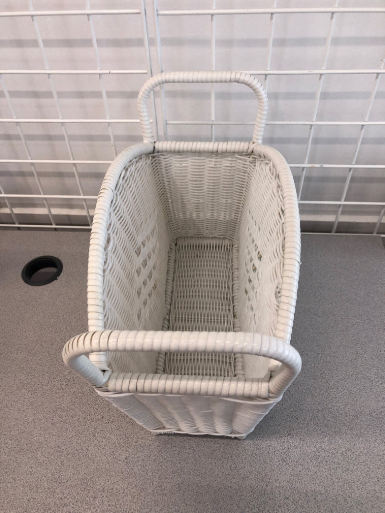 WHITE WICKER MAGAZINE HOLDER.