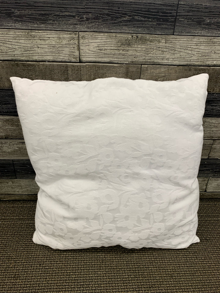 WHITE FLORAL THROW PILLOW.