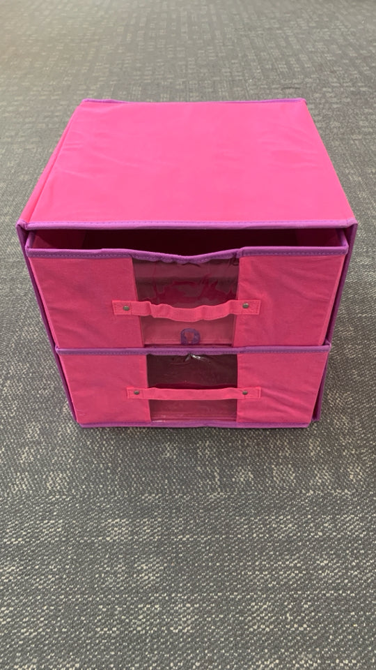 STACKED PINK & PURPLE COLLAPSING BINS.