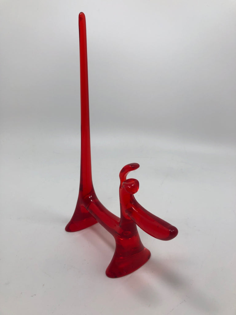 RED RESIN DOG SCULPTURE.