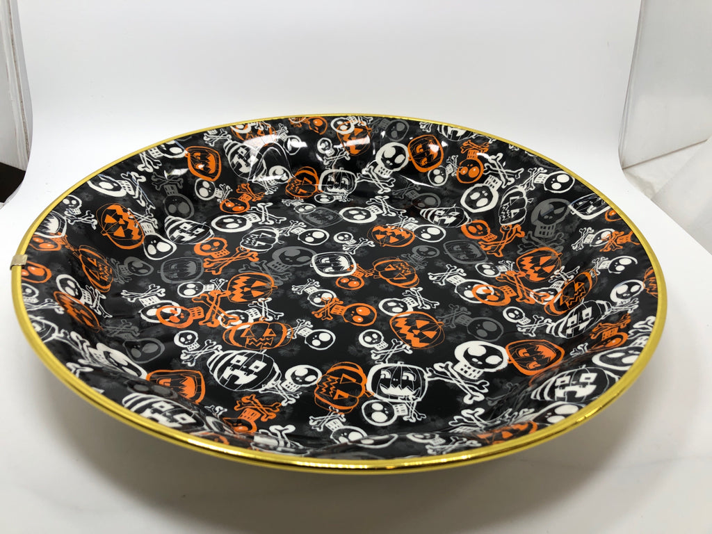 PLASTIC SKULL AND JACK O LANTERN BOWL.