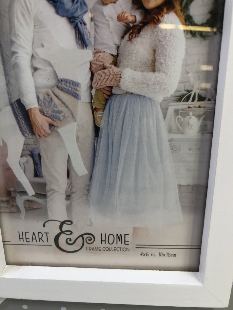 GRAY AND WHITE WOODEN PICTURE FRAME W/POLKA DOTS.