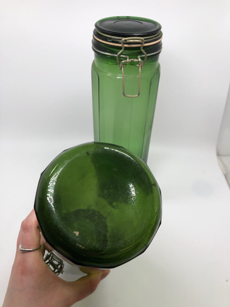 2 GREEN GLASS CANISTERS.