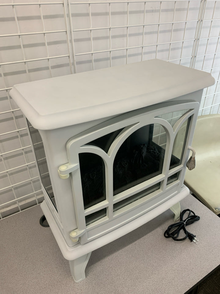 LIGHT BLUE ELECTRIC STOVE FIREPLACE.