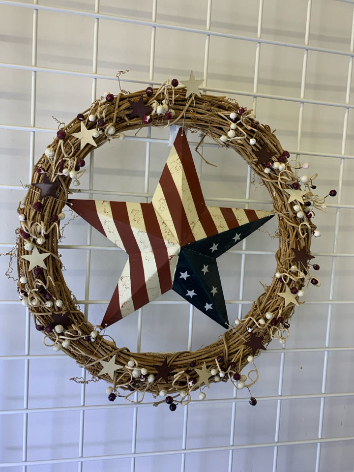 PRIMITIVE PIP AND STARS TWIG WREATH WITH FLAG STAR CENTER.
