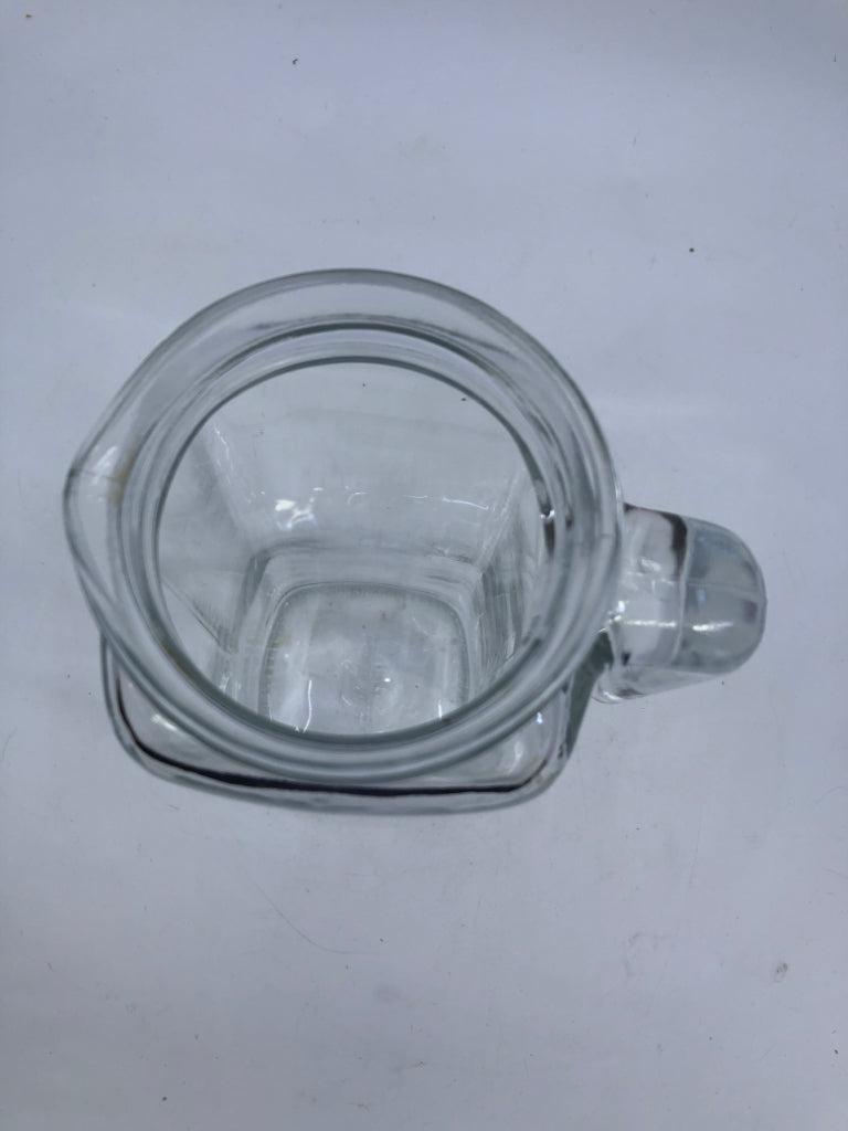 CLEAR GLASS PITCHER.