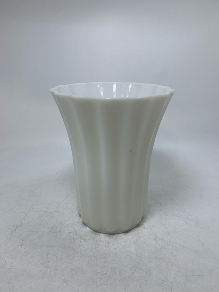 RIBBED MILK GLASS VASE W/ FLARED TOP.