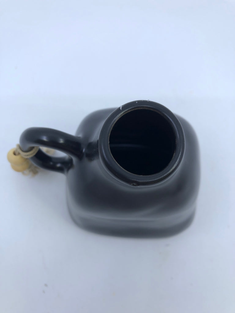 SMALL BLACK JUG/VASE W WOOD BEADS.