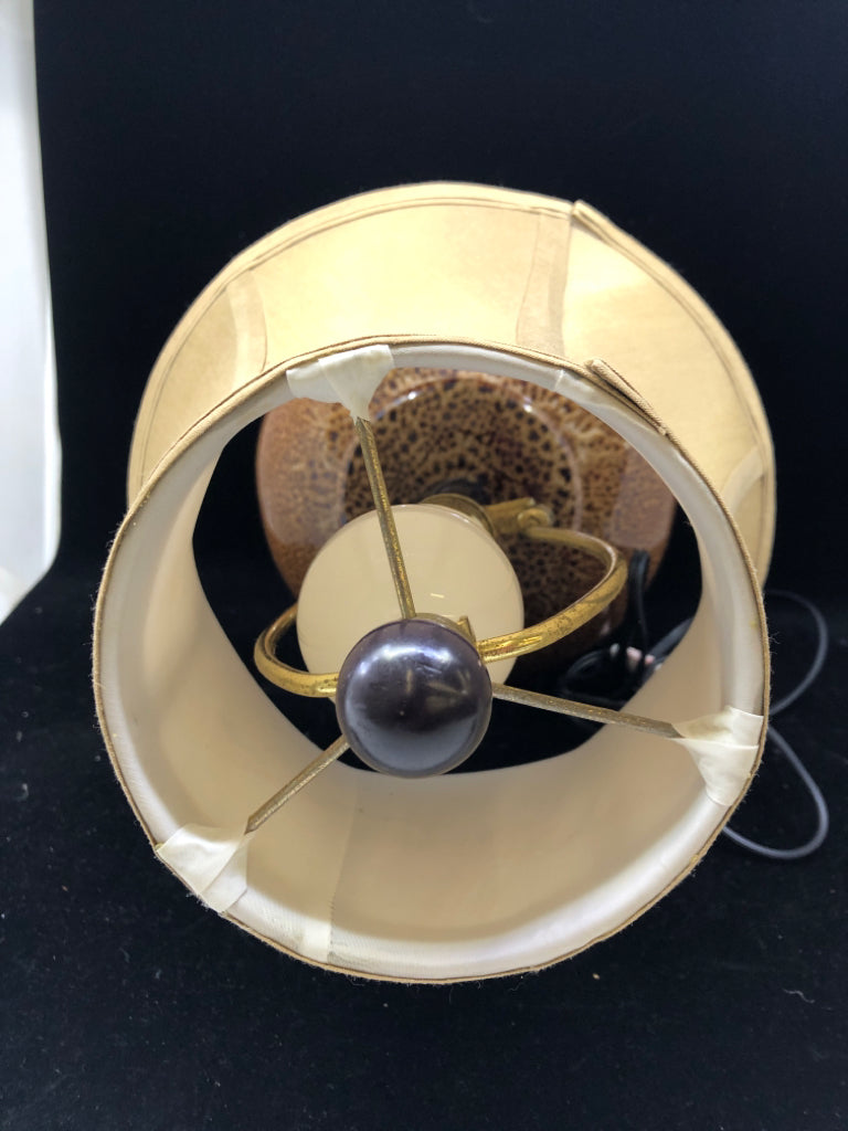 BROWN POTTERY BASE LAMP W TAN SHADE.