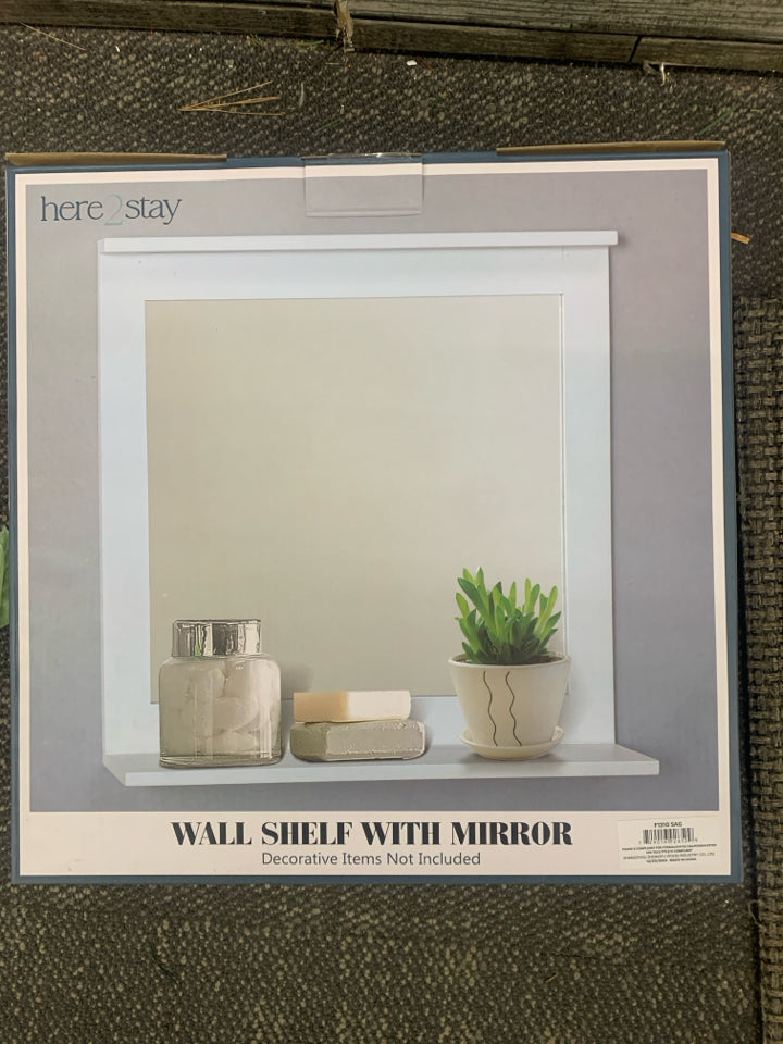 NIB WALL SHELF WITH MIRROR.