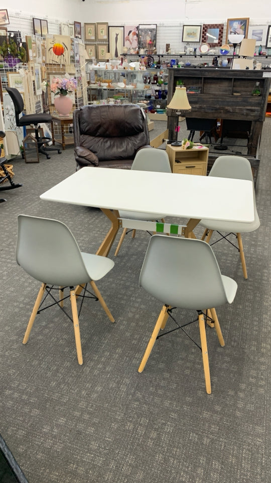 4 CHAIRS + WOOD TABLE W/ANGLED WOOD LEGS.