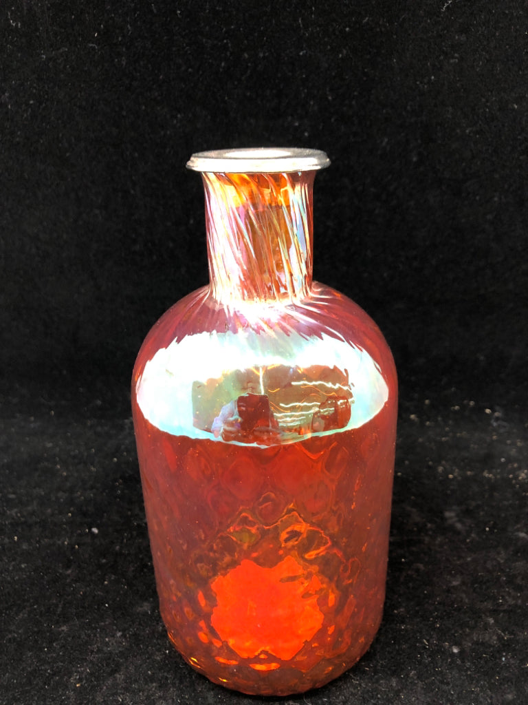 ORANGE GLASS TAPER CANDLE HOLDER.