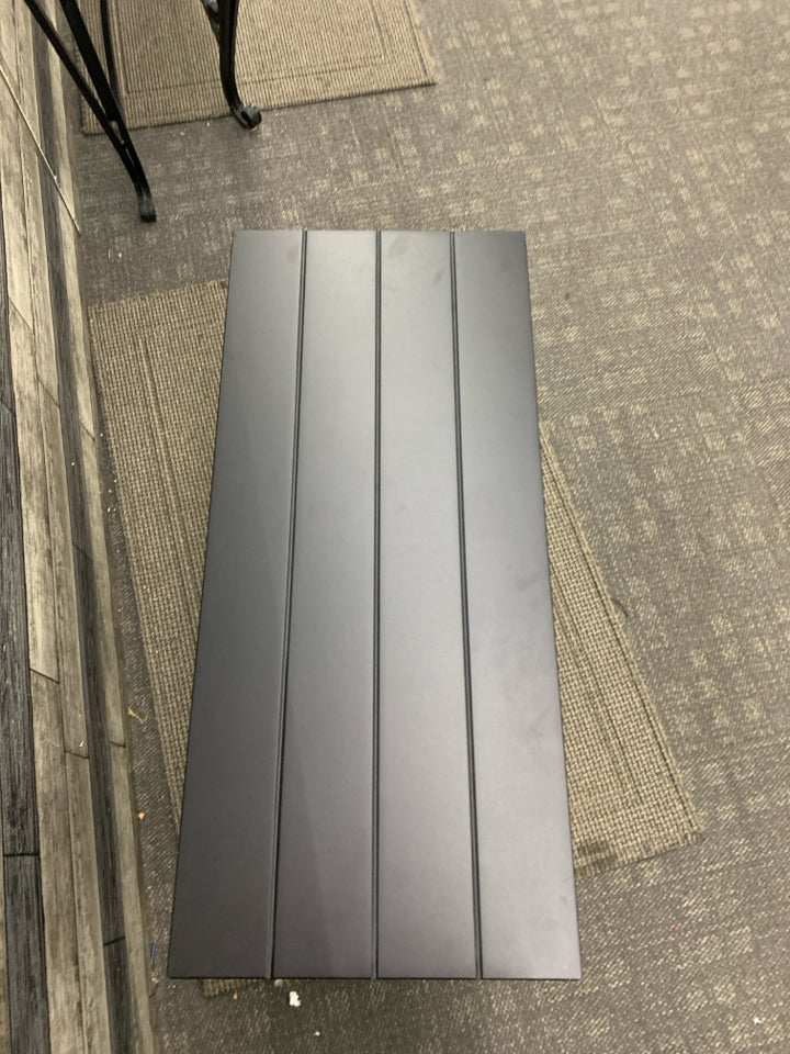 BLACK METAL BENCH W/2 SHELVES UNDERNEATH.