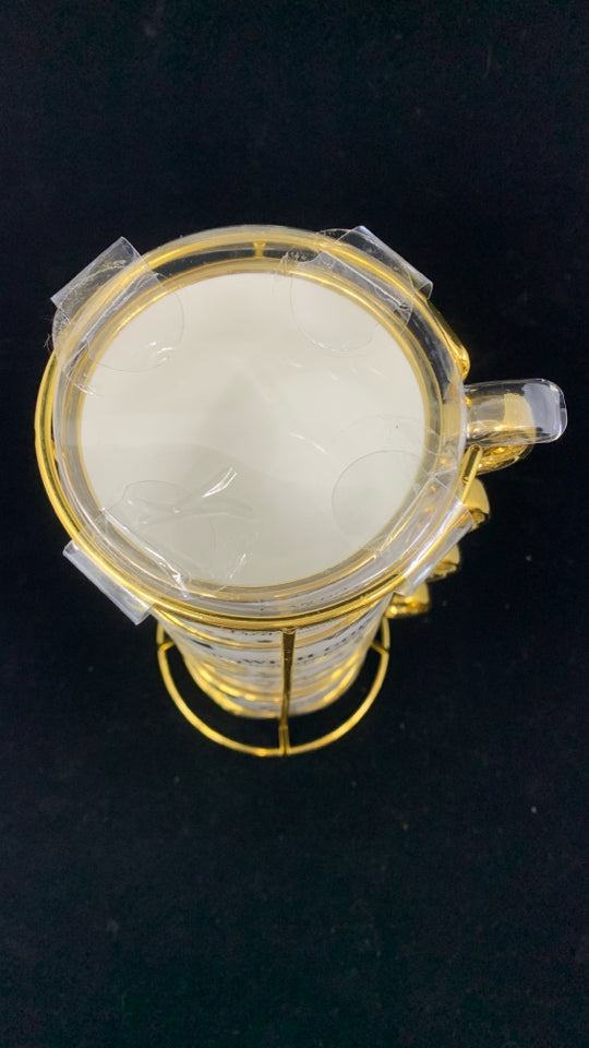 4 GOLD RIMMED I CAN DO ALL THINGS MUGS IN STAND.