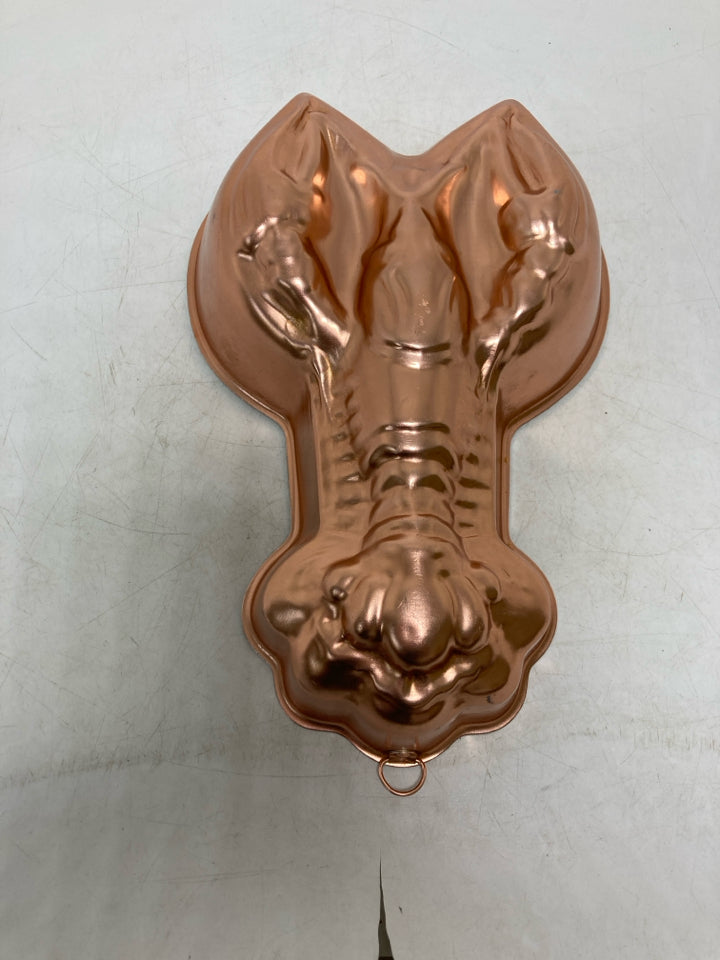 LOBSTER SHAPED COPPER COLORED MOLD.