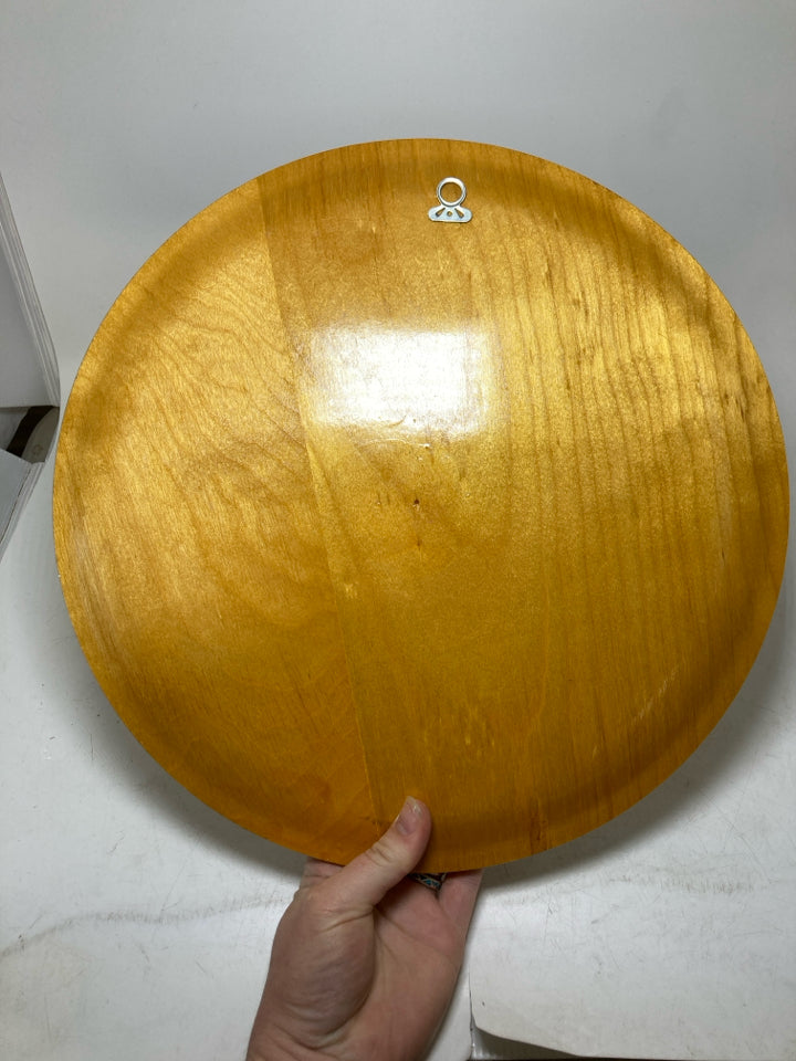 WOOD GLAZED CIRCLE W/ PLANTED FLOWERS.