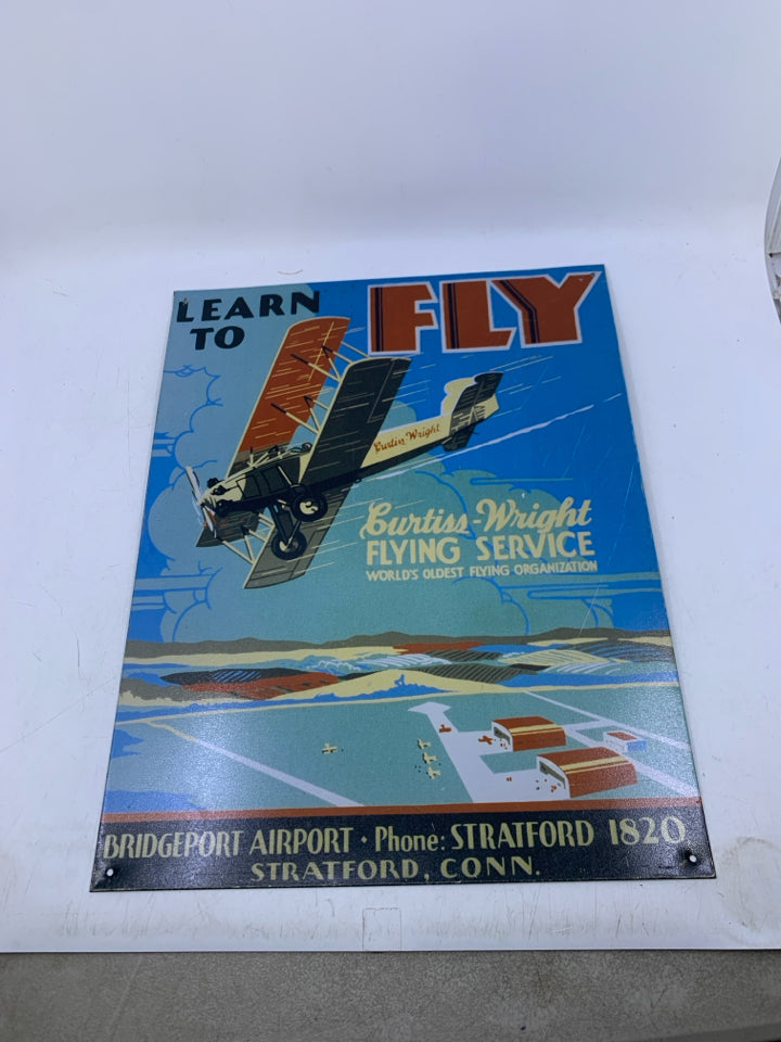 METAL LEARN TO FLY SIGN.