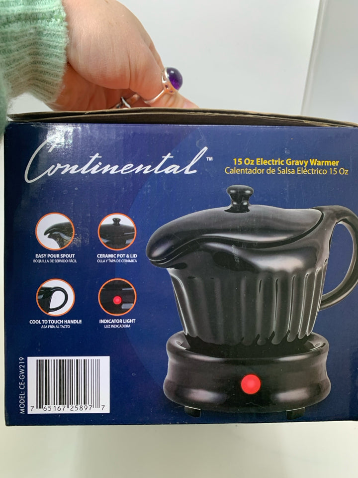 NIB GRAVY BOAT WARMER.