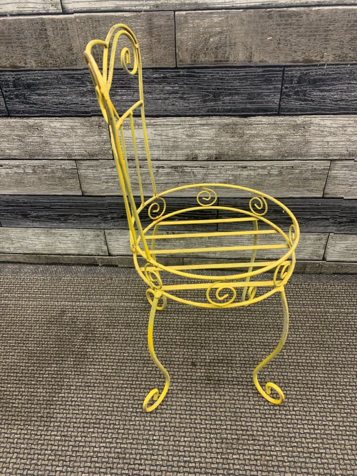 YELLOW METAL CHAIR PLANT STAND.