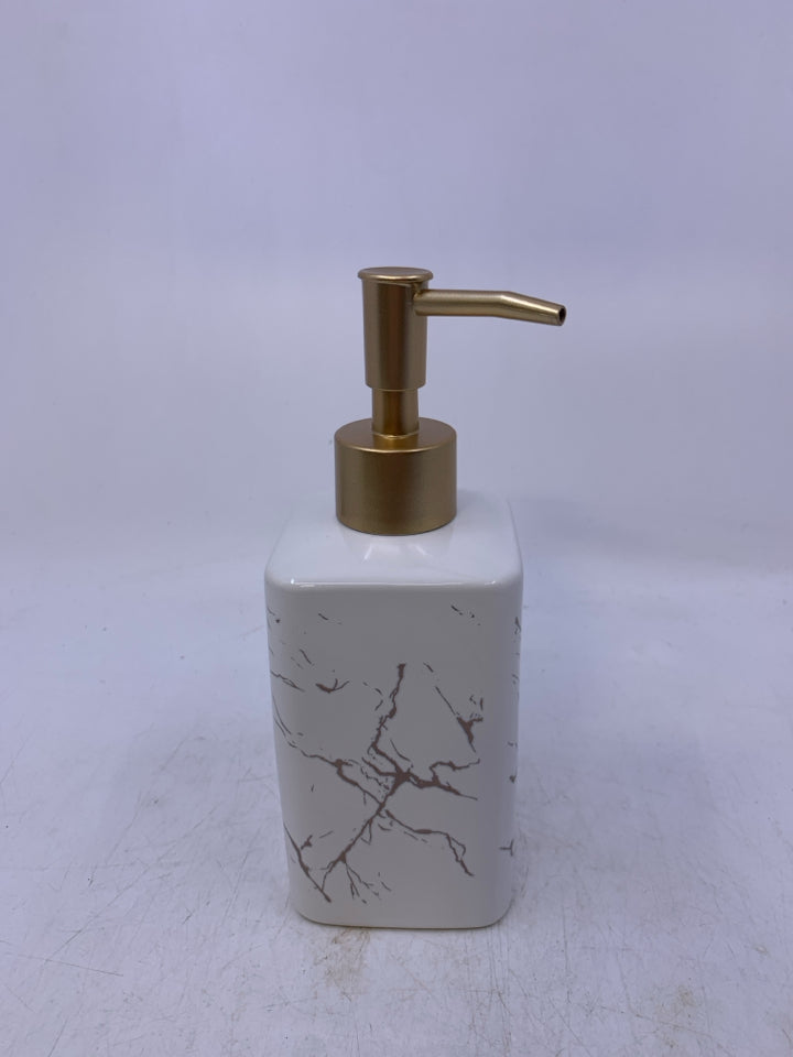 CERAMIC MARBLE LOOK W/ GOLD PLASTIC TOP.