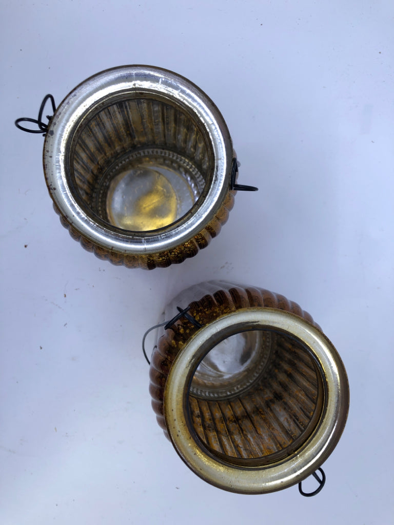 2 TALL GOLDEN MERCURY GLASS CANDLE HOLDER W/WIRE HANDLE.
