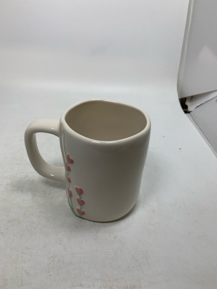 LOVE GROWS HERE MUG.