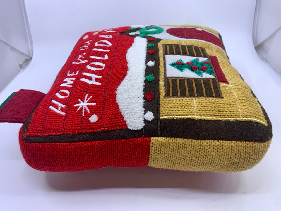 "HOME FOR" RED ACCENT SWEATER PILLOW.