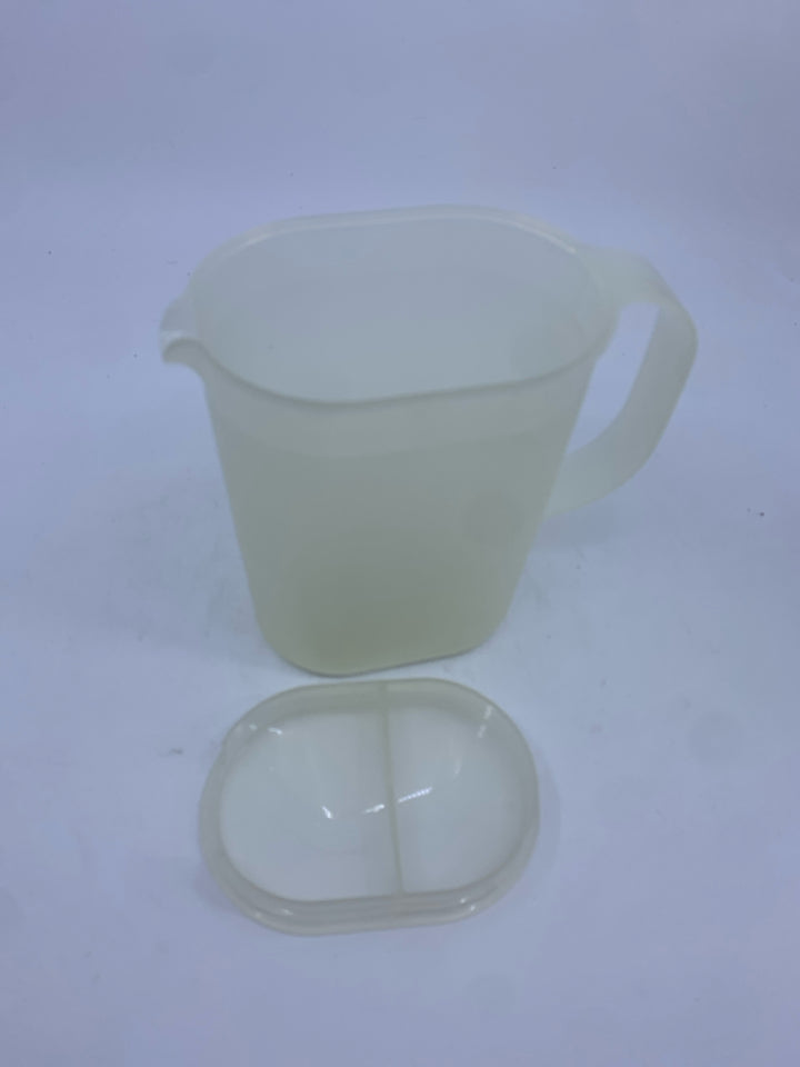 CLEAR TUPPERWARE DISPENSER.