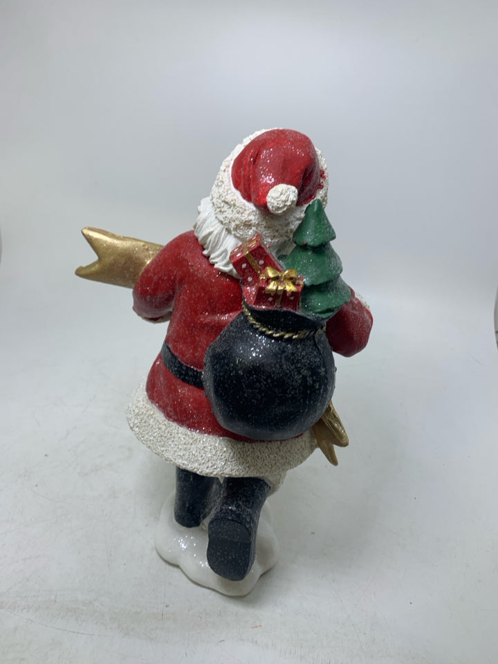 SPARKLE RESIN RUNNING SANTA W/ GOLD MERRY CHRISTMAS BANNER.