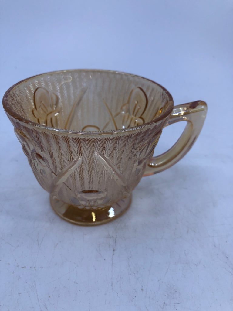 VTG CARNIVAL GLASS TEA CUP/SAUCER EMBOSSED FLOWERS.