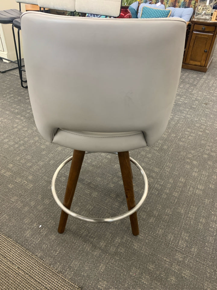 FAUX GREY LEATHER SWIVEL BAR STOOL.