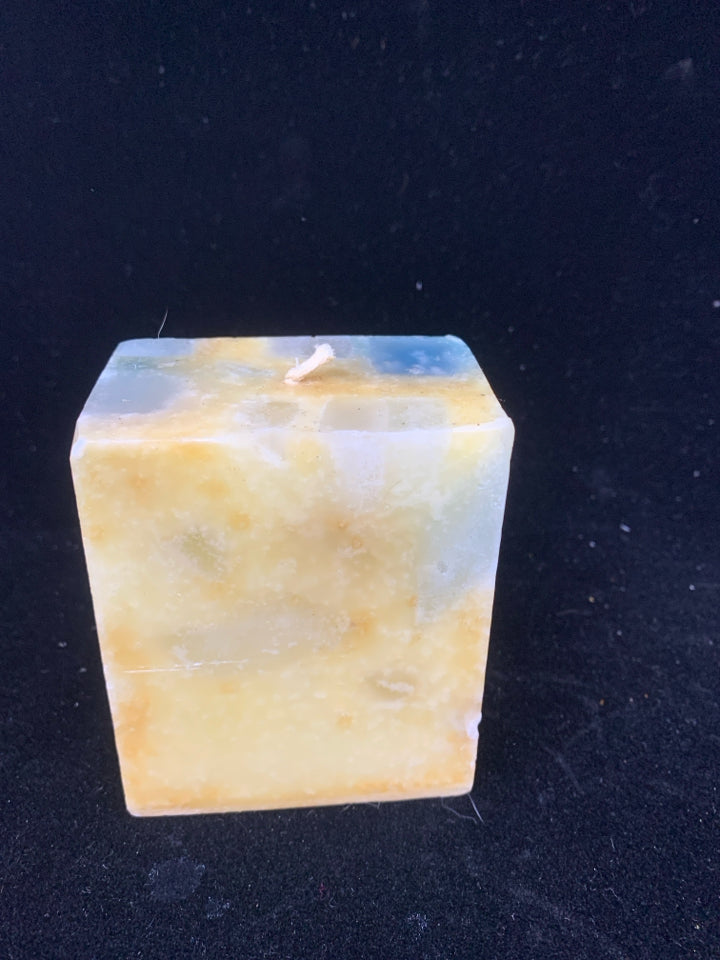 YELLOW & BLUE DECORATIVE SQUARE CANDLE.