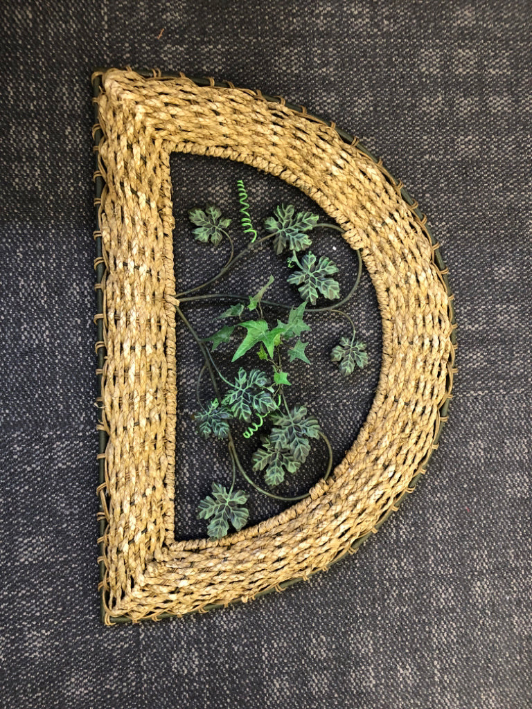 GREEN IVY AND WICKER WALL HANGING.