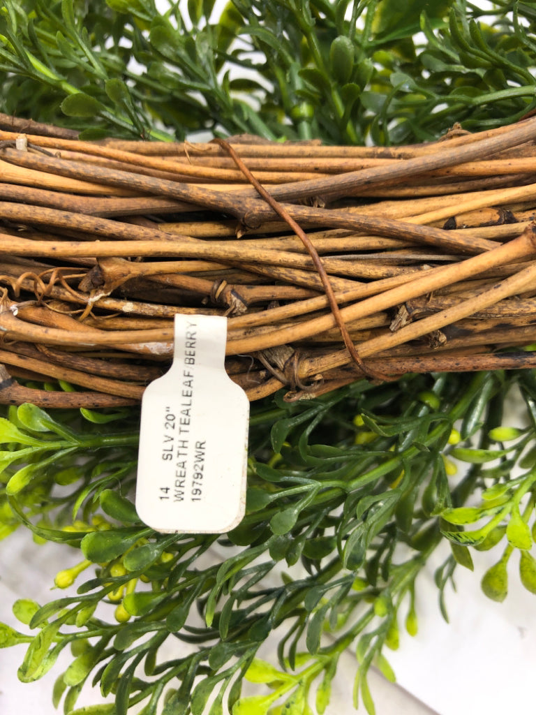 TWIG W GREENS WREATH.