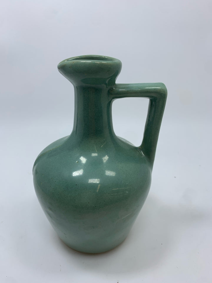 GREEN GLAZED POTTERY PITCHER W/STOPPER.