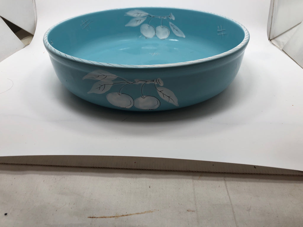 BLUE CERAMIC SERVING BOWL W/WHITE PAINTED FRUITS.